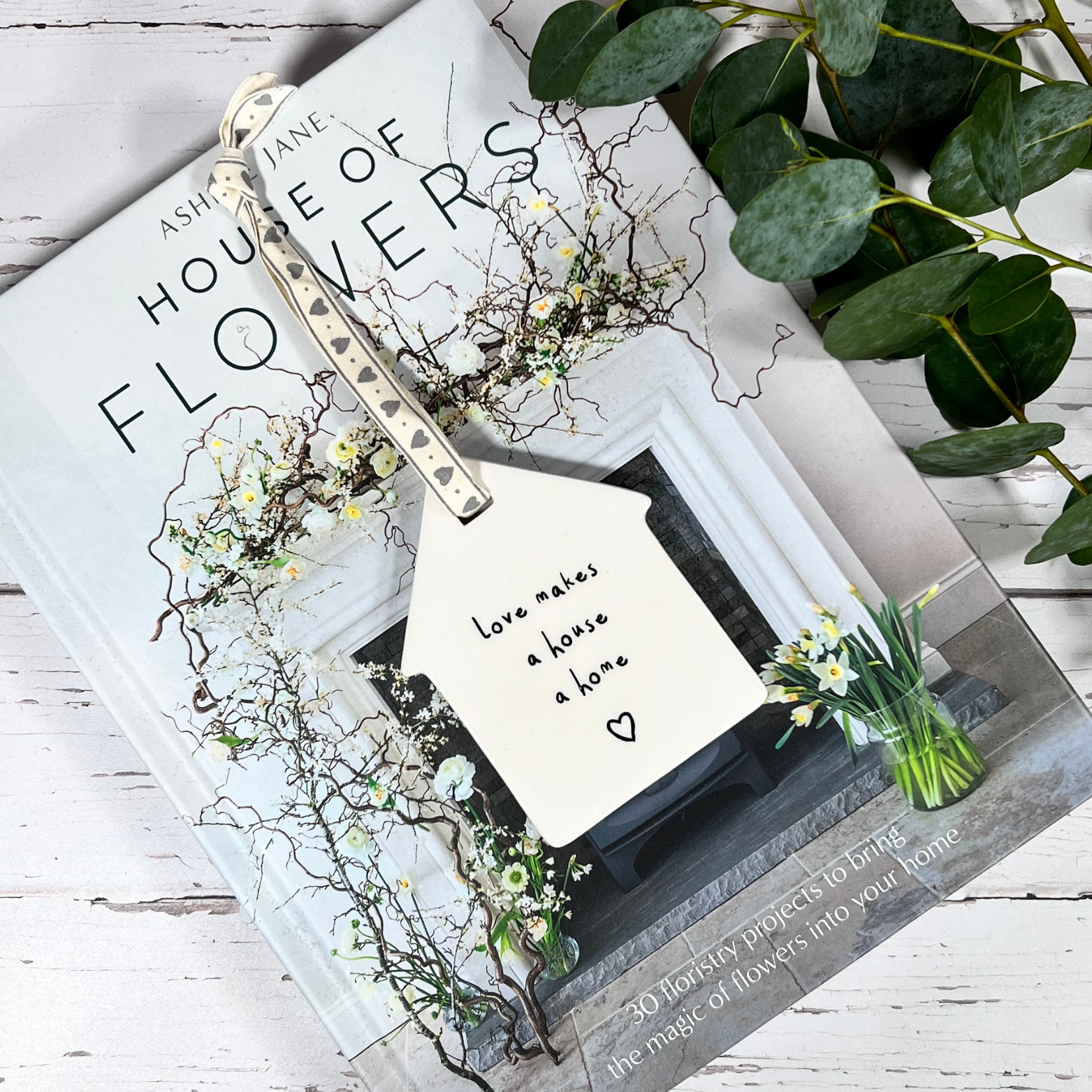 love makes a house a home hanging house