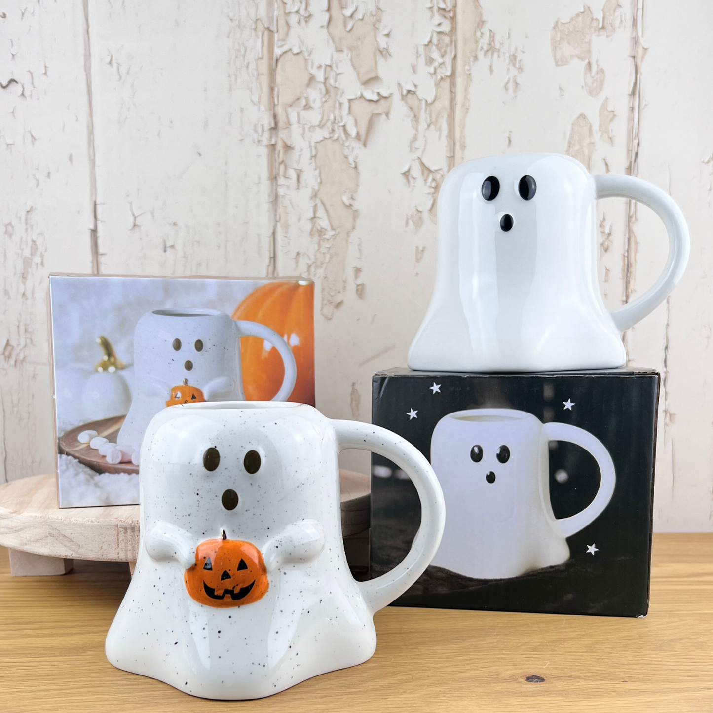 Ghost mug duo with boxes.