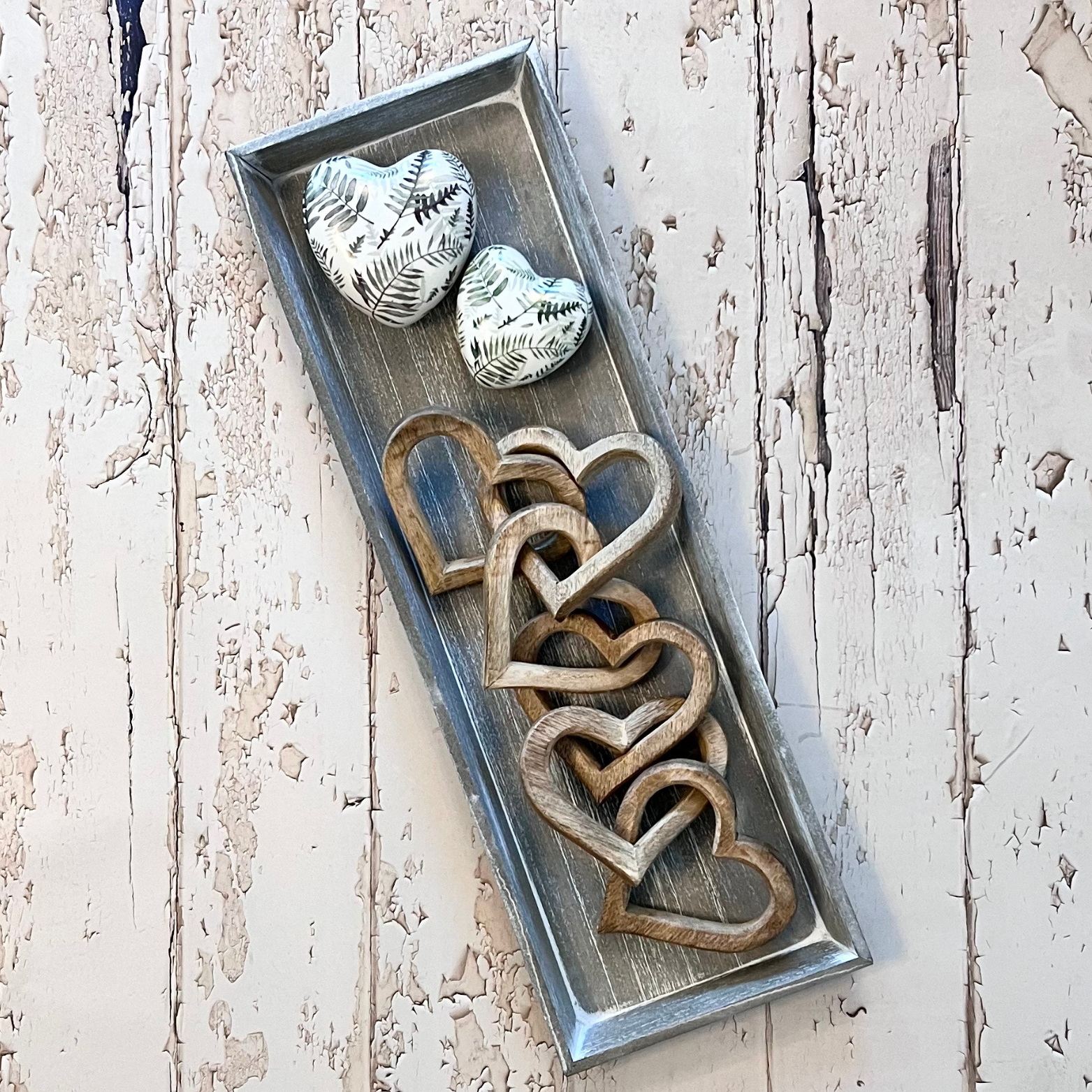 antique white tray with heart chain