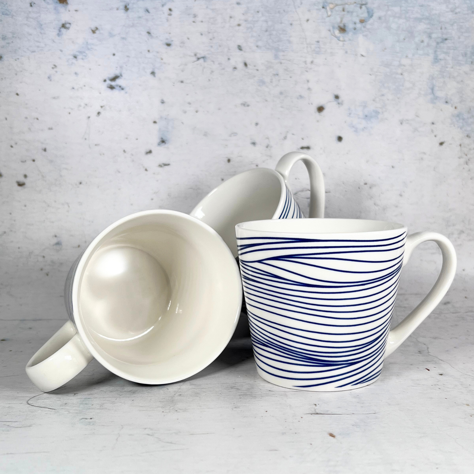 azure mug with blue design pairs with azure tray and bowl