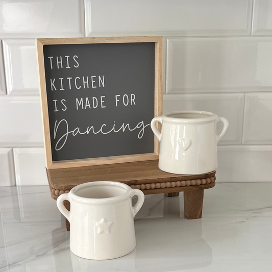 'this kitchen is for dancing' sign