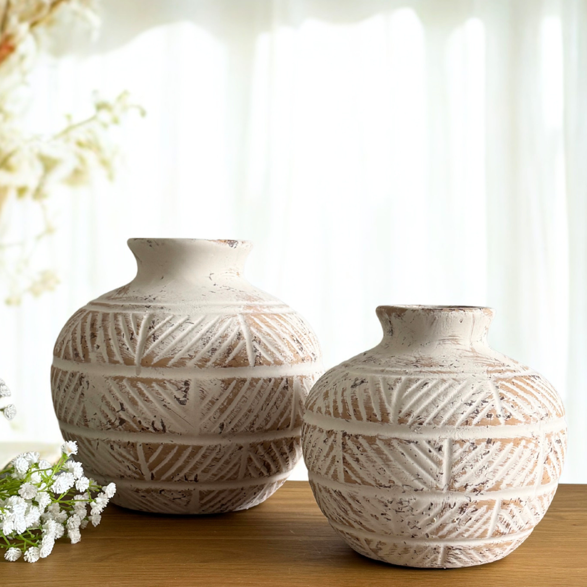 etched vase with white pattern detail