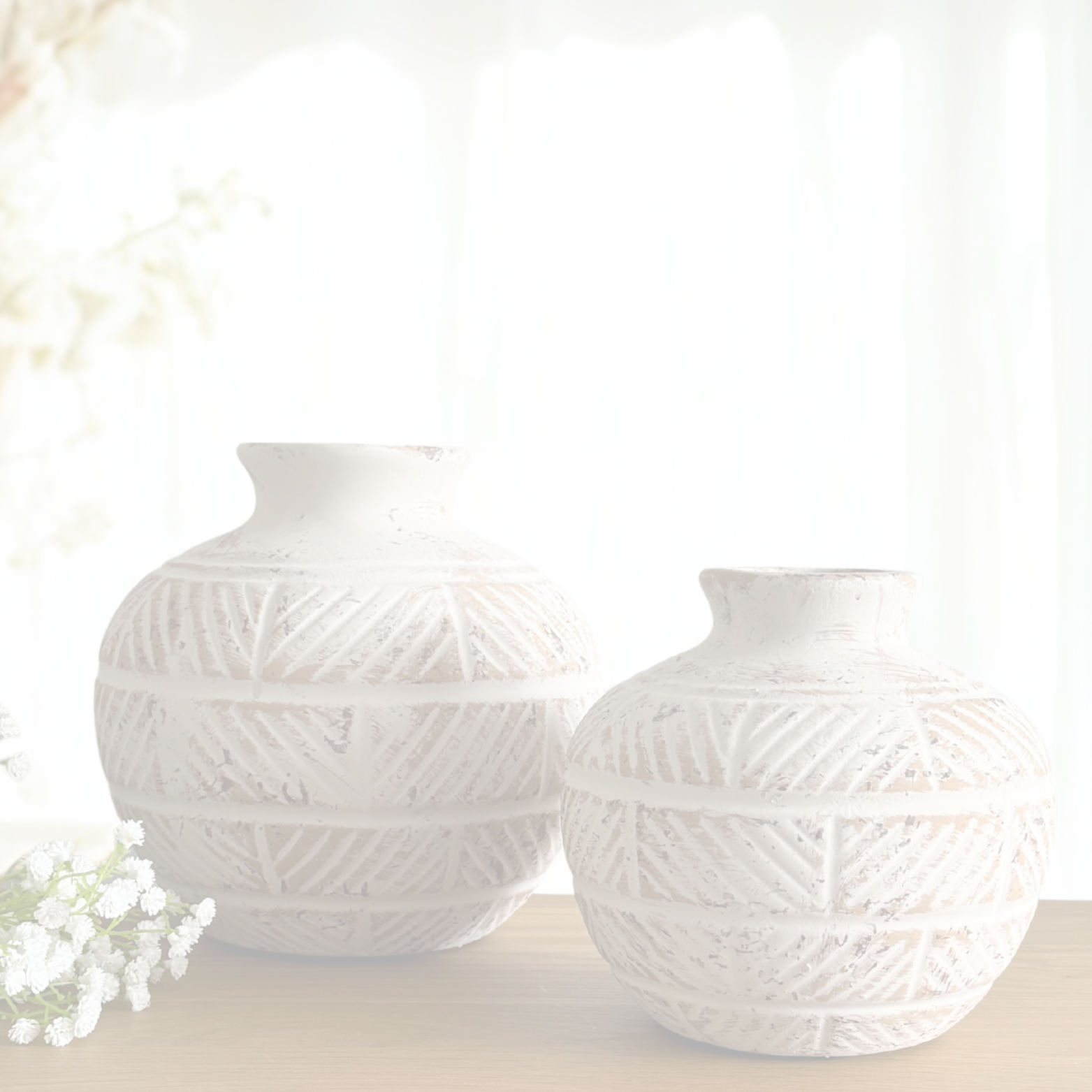 Two white textured vases on a light background