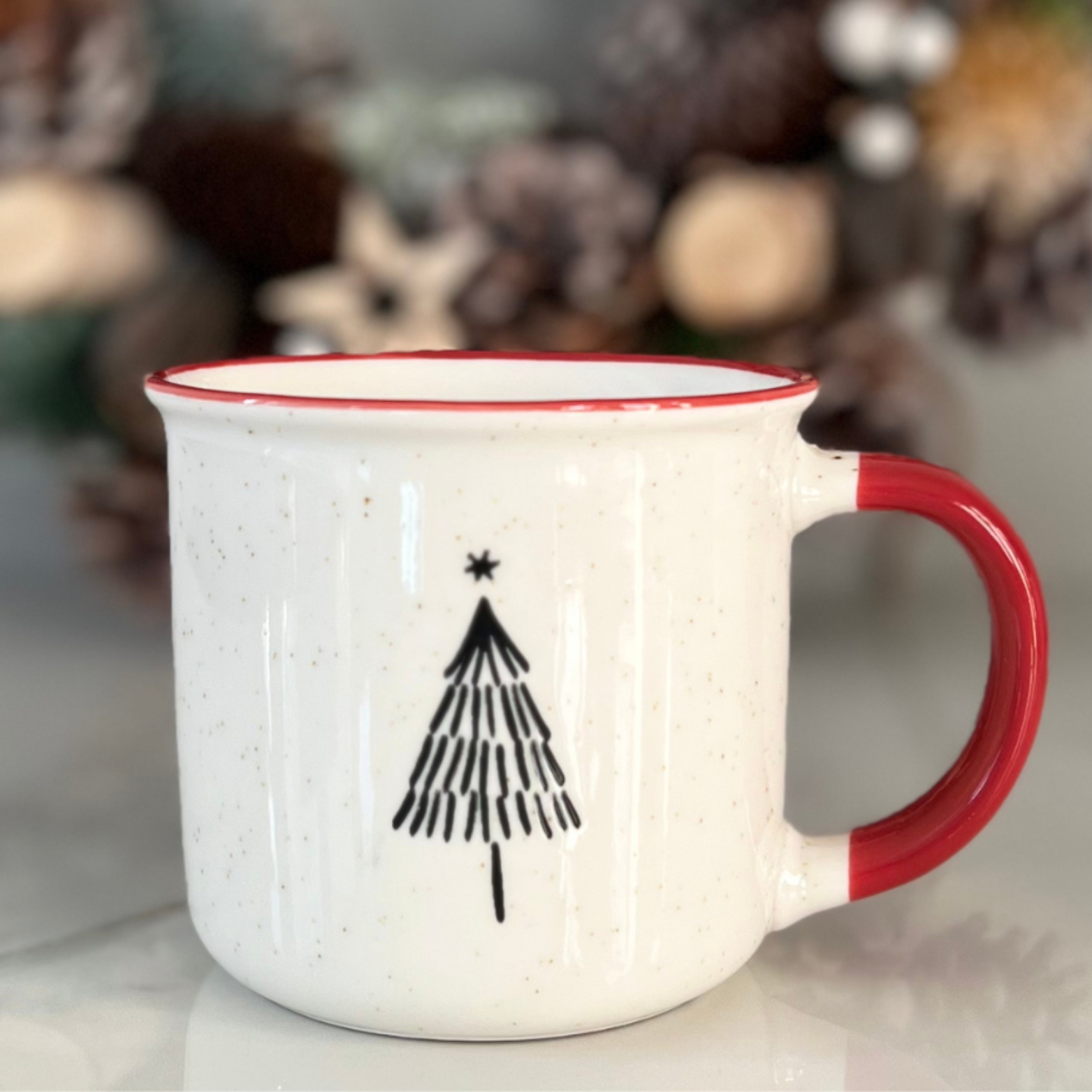 full tree mug with red handle