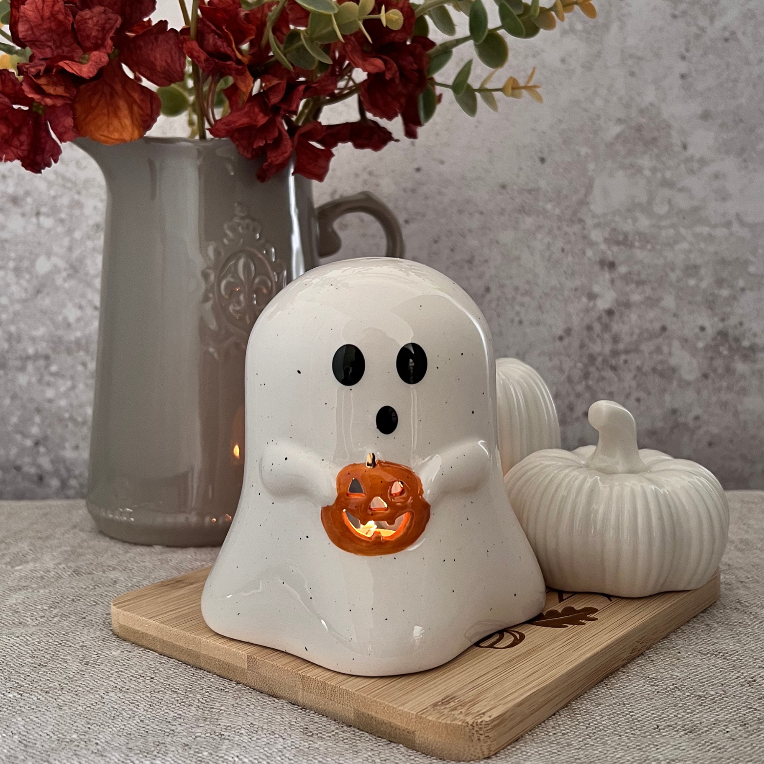 ghost tea light holder with pumpkin lit