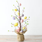 Easter tree with pastel and white eggs decorations.