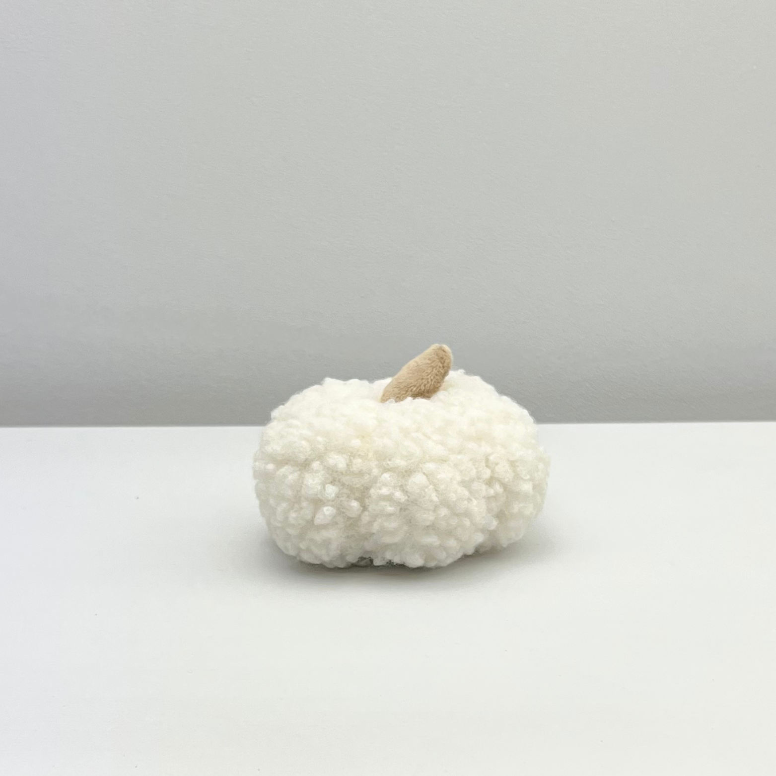 small white sherpa pumpkin