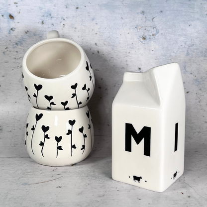 milk jug with mugs