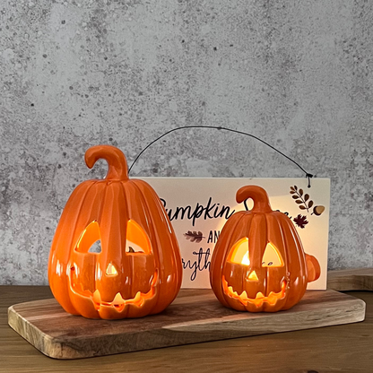 orange jack-o-lanterns lit up