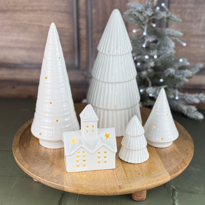 round tyling board styled with ceramic christmas trees