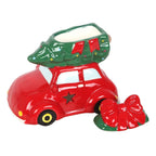 Red car with a green tree on top and a red bow on a white background