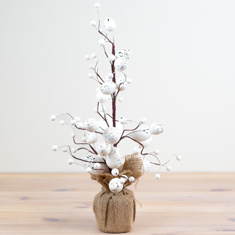 Easter tree with white eggs decorations.